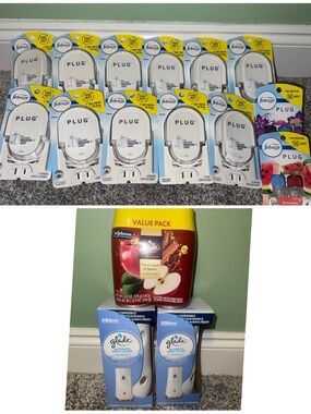 11 Febreze Plug-In Oil Warmers & 2 Glade Spray Holders with refills